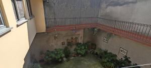an overhead view of a balcony with plants at Oleggio apartment in Oleggio