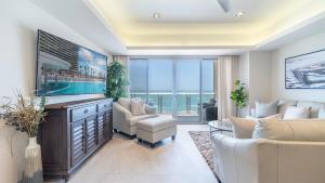 a living room with a view of the ocean at Modern Seaside Retreat Boasting Unforgettable Scenery in Puerto Peñasco