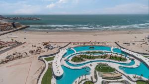 an aerial view of a resort and the beach at Modern Seaside Retreat Boasting Unforgettable Scenery in Puerto Peñasco
