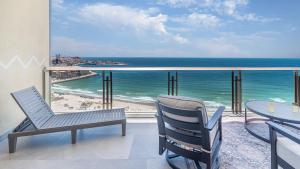 a balcony with a view of the ocean at Elegant Ocean Getaway Designed for Relaxation and Luxury in Puerto Peñasco