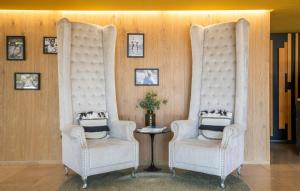 two chairs sitting next to each other in a room at Leonardo Boutique Hotel Mallorca Port Portals - Adults only in Portals Nous +57 photos