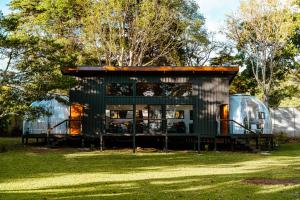 a small green building with a glass dome at AMANI Casa Suite in San Rafael