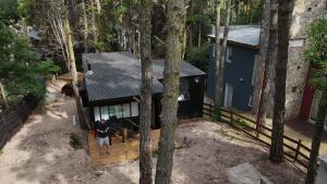 an aerial view of a house in the woods at Big Sur in Mar Azul