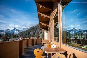 a balcony with a view of mountains at Enzian Inn in Leavenworth