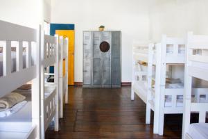 Кровать или кровати в номере CURIOCITY Backpackers Johannesburg