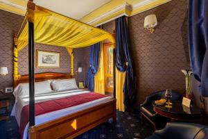 เตียงในห้องที่ Hotel Manfredi Suite In Rome +149 ภาพ