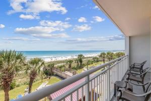 a balcony with a view of the beach at Camelot by the Sea Oceanfront 2BR in Myrtle Beach