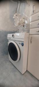 a washer and dryer in a room at House Calmaria in Novigrad Dalmatia