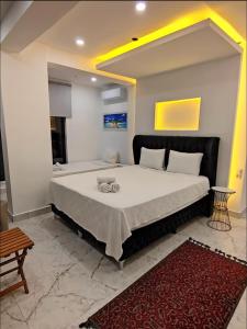 a bedroom with a large bed in a room at My Palace Villa Heated Pool in Belek