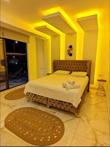 a bedroom with a large bed in a room at My Palace Villa Heated Pool in Belek