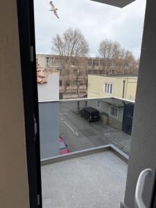 a view of a street from a window at MavCity Boutique in Constanţa