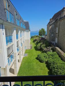 a view from the balcony of a building at Le cosy des Sables Blancs in Douarnenez