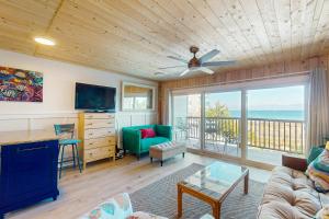 a living room with a view of the ocean at Sun Mark 253 in Ocean City