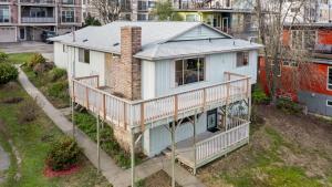 an aerial view of a house with a deck at Cozy Hilltop Seattle Stay with Yard & Parking in Seattle