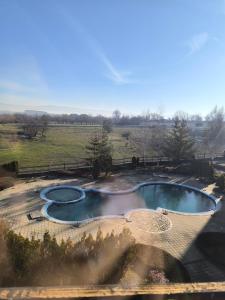 a view of a hot spring in a yard at Sasha Yo in Razlog