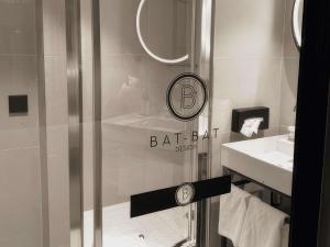a bathroom with a shower and a sink at Mercure Paris 17 Batignolles in Paris