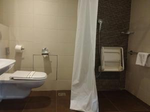 Un baño de Hotel Aurel
