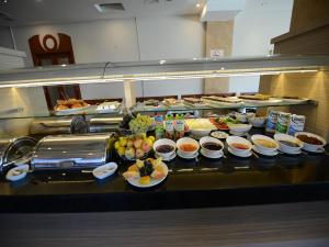 a buffet line with many different dishes of food at Samsun Airport Resort Hotel in Samsun