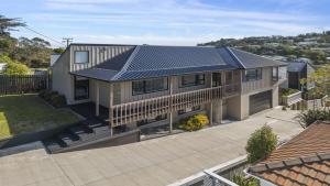 an image of a house with solar panels on it at Suthar's Home in Wellington