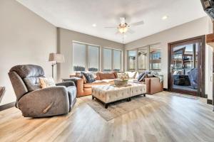 a living room with a couch and a table at Bridges Bay Resort Bayside Building 203 in Arnolds Park +77 photos