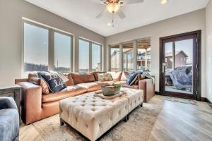 a living room with a couch and a table at Bridges Bay Resort Bayside Building 203 in Arnolds Park