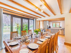 a large dining room with a long table and chairs at 5 Bed in Ashford oc-76428 in Smarden