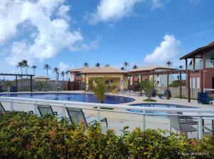 a view of a swimming pool at a resort at Apartamento Garden in Baixio