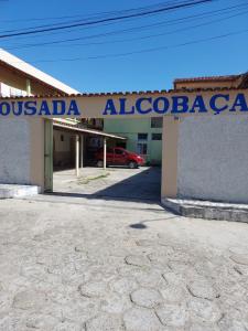 a building with a sign that readsossada albuquerque at Pousada Alcobaça in Alcobaça