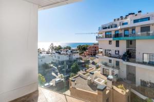 a view from the balcony of a building at Waterfront Seaview Residence in Villajoyosa