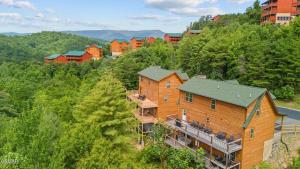 an aerial view of a large wooden house on a hill at Cabin in Sevierville in Sevierville