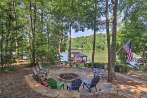 a fire pit with chairs and a gazebo at Dockside Lakefront Escape Deck Views in Jacksons Gap +37 photos