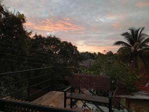 a bench sitting on top of a set of stairs at Villa Aloe Vera- Signature Rooms in Weligama