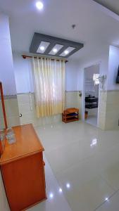 a large white room with a room with a room at Khách Sạn FLORÉA in Phan Rang–Tháp Chàm