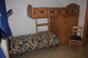Posteľ alebo postele v izbe v ubytovaní Chalet Alberti