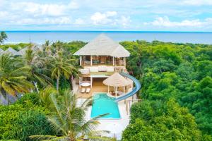 an aerial view of a resort with a swimming pool at Soneva Jani in Dhigurah