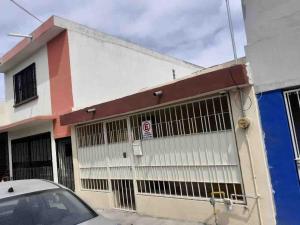 a building with a car parked in front of it at Loft 1 with 2 beds near Fundidora and Cintermex in Monterrey