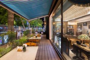 a balcony of a restaurant with a view of the street at Orange Crystal Hotel Yantai Binhai Square in Yantai