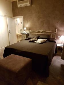 a bedroom with two beds in a room at Piazza Signoria Suite in Florence