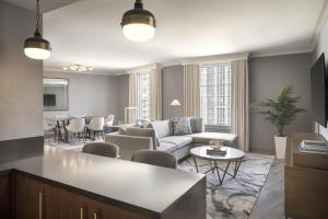 a living room with a couch and a table at Grand Hyatt Atlanta in Buckhead in Atlanta