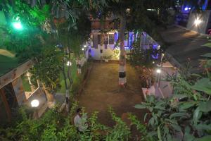 an overhead view of a garden at night at Heavens Hotel in Agra