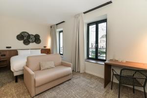 Zona d'estar a Hotel Rivella - The Originals Boutique