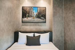 Krevet ili kreveti u jedinici u okviru objekta BRIX Hotel