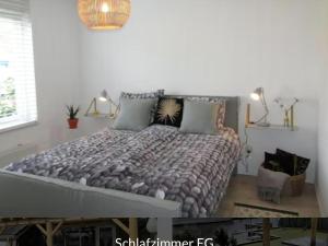 a bedroom with a large bed in a room at Park De Markol Love Lemmer in Lemmer