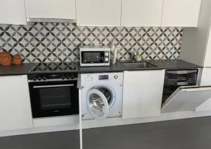 Køkken eller tekøkken på City Business Flat, Gare, Bus & Centre à Pied