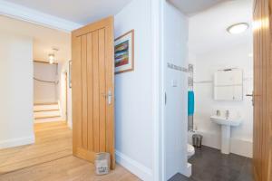 a bathroom with a toilet and a sink at Ty Top in Newport +32 photos