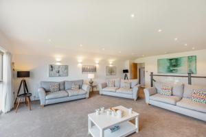 a living room with couches and a table at 6 Bed in Docklow oc-d31042 in Docklow