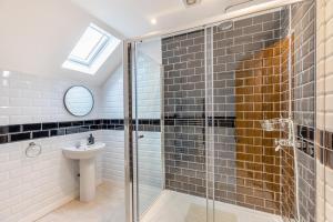 a bathroom with a glass shower and a sink at 6 Bed in Docklow oc-d31042 in Docklow +38 photos