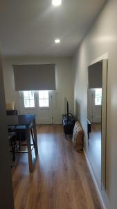 a living room with a table and a dining room at Apartamento Porta14 2 in Chaves