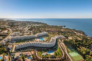 an aerial view of a resort next to the ocean at W Algarve in Albufeira +209 photos
