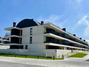 a building with a dome on top of it at Apulia Seawind in Apúlia